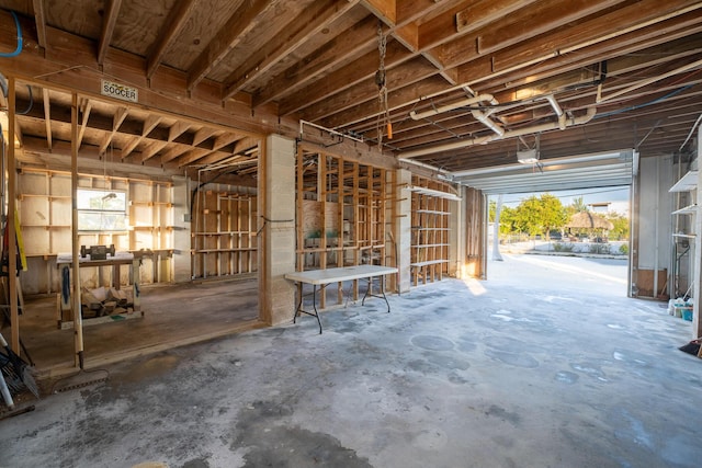 misc room with concrete flooring