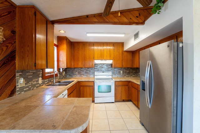 kitchen featuring light tile patterned flooring, white electric range, tasteful backsplash, sink, and stainless steel fridge with ice dispenser