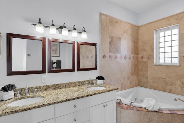 23 S Kyle Way, Marathon, FL 33050 - bathroom featuring tiled tub and vanity