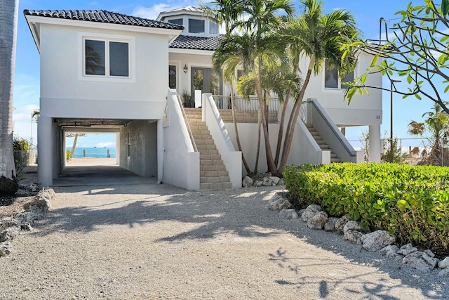 view of front facade with a carport