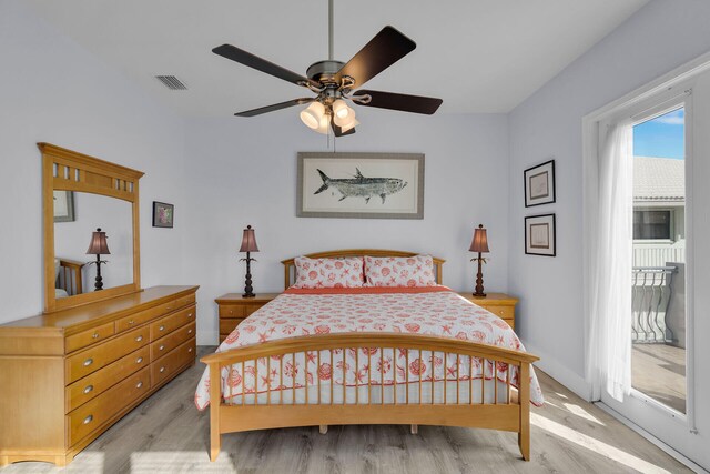 23 S Kyle Way, Marathon, FL 33050 - bedroom featuring ceiling fan, light hardwood / wood-style flooring, and access to outside