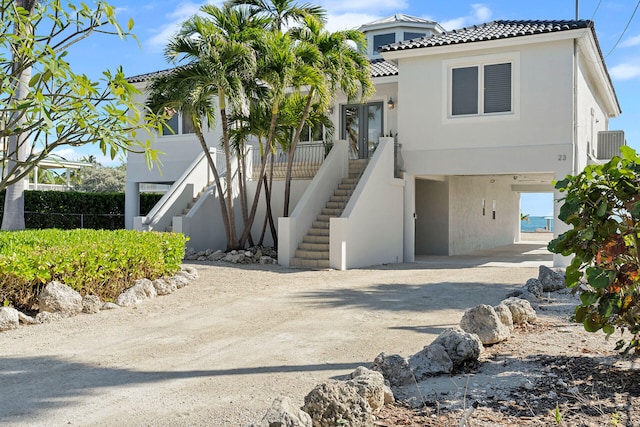 23 S Kyle Way, Marathon, FL 33050 - view of front of home featuring a carport and cooling unit