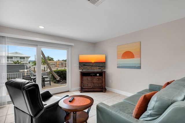 living room with light tile patterned floors