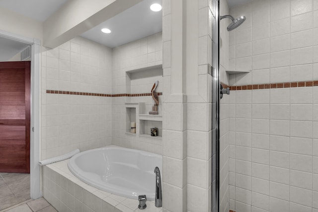 bathroom featuring separate shower and tub and tile patterned flooring