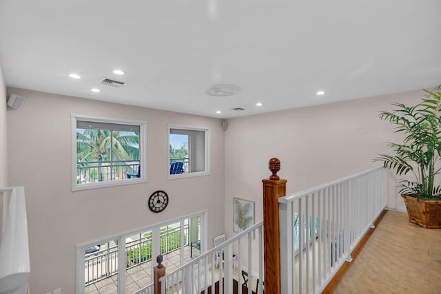 hallway with a towering ceiling