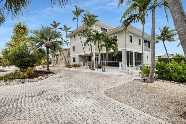 exterior space with a sunroom