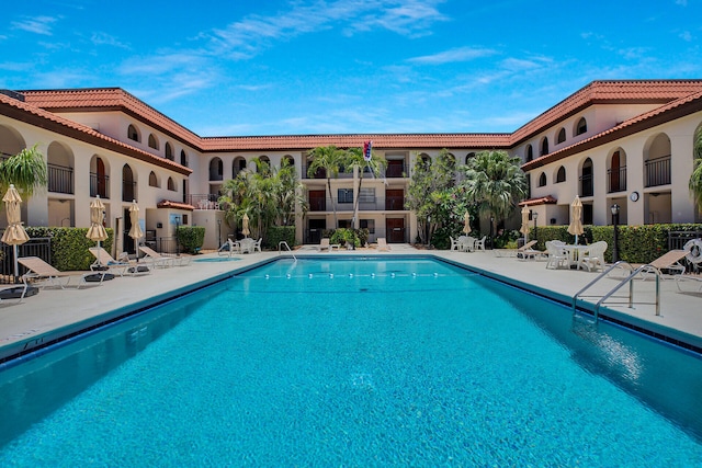 view of swimming pool featuring a patio