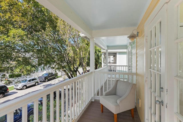 balcony featuring covered porch