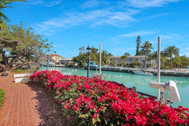 view of home's community featuring a water view