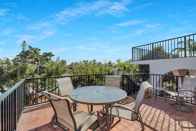 exterior space with outdoor dining area