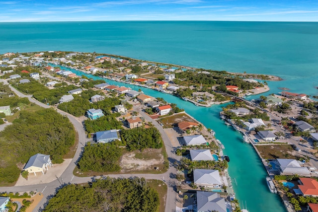 bird's eye view with a residential view and a water view