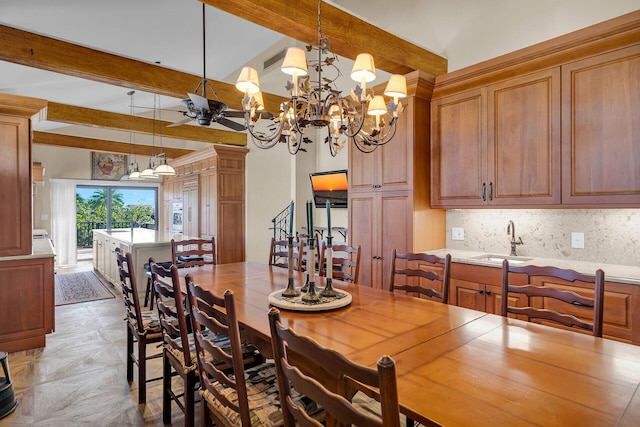 dining area featuring a ceiling fan, visible vents, and beamed ceiling