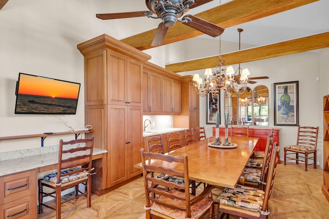 dining area featuring ceiling fan with notable chandelier, high vaulted ceiling, built in desk, and beam ceiling