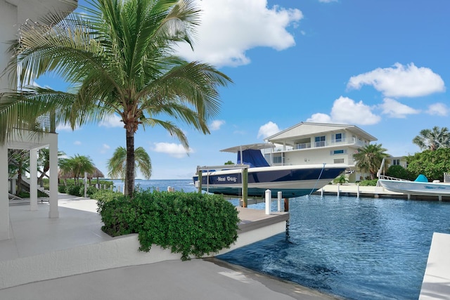 exterior space with a boat dock and a water view