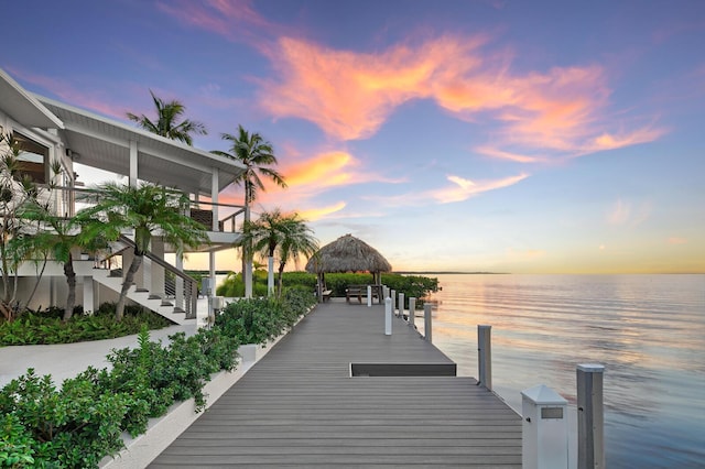 dock area featuring a gazebo and a water view