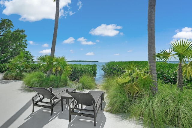 view of patio featuring a water view