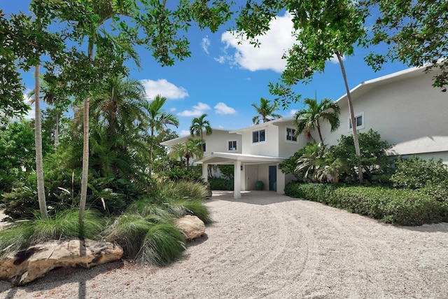 view of front of property with a carport