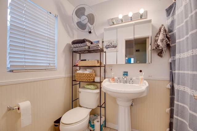 bathroom featuring sink and toilet