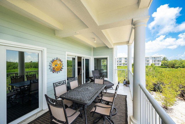 5960 Peninsular Ave Unit 101, Stock Island, FL 33040 - wooden deck featuring outdoor dining space