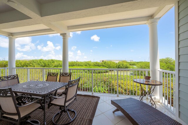 5960 Peninsular Ave Unit 101, Stock Island, FL 33040 - wooden deck with outdoor dining space