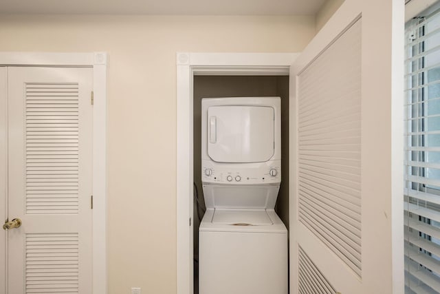5960 Peninsular Ave Unit 101, Stock Island, FL 33040 - washroom featuring stacked washer / drying machine