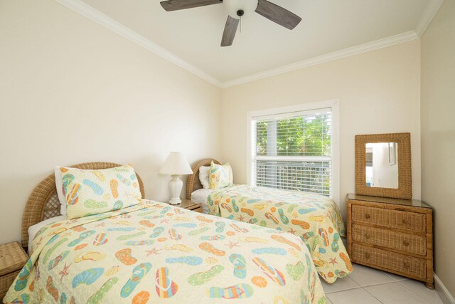 5960 Peninsular Ave Unit 101, Stock Island, FL 33040 - bedroom featuring ornamental molding, tile patterned flooring, ceiling fan, and baseboards