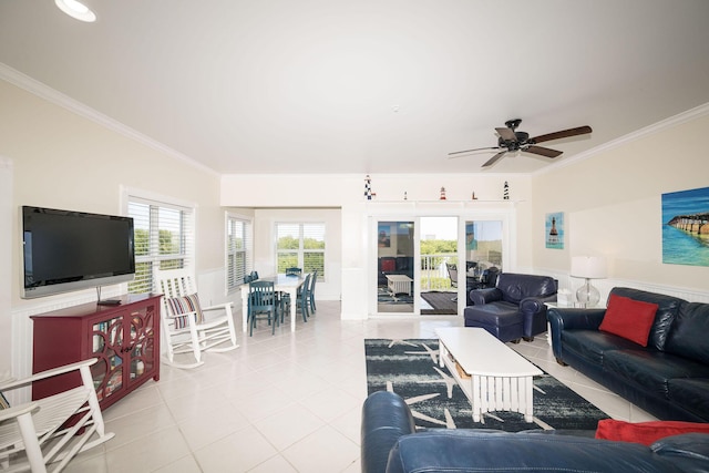5960 Peninsular Ave Unit 101, Stock Island, FL 33040 - living room with light tile patterned flooring, ornamental molding, ceiling fan, and plenty of natural light