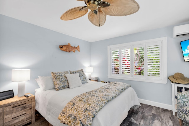 bedroom featuring ceiling fan, dark wood-type flooring, and a wall unit AC