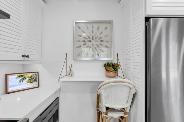 interior space with stainless steel fridge