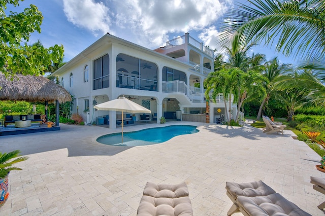 view of swimming pool with a patio