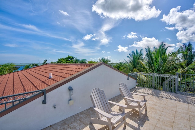 view of patio featuring a water view