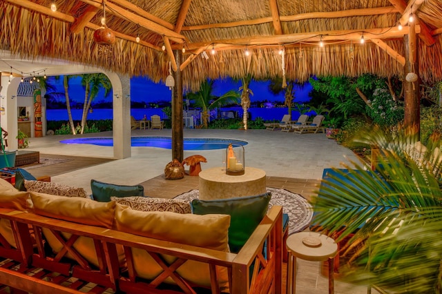 exterior space with a gazebo and an outdoor hangout area