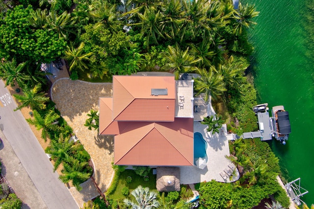 birds eye view of property featuring a water view