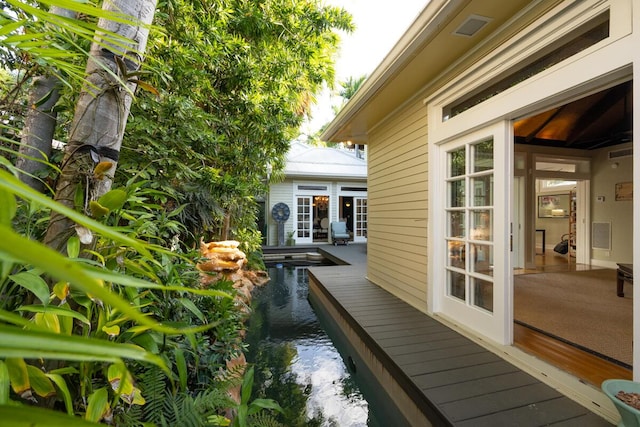 view of side of home featuring an outdoor structure