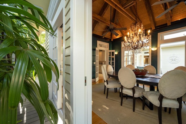 dining area with wood ceiling, high vaulted ceiling, beam ceiling, and wood finished floors