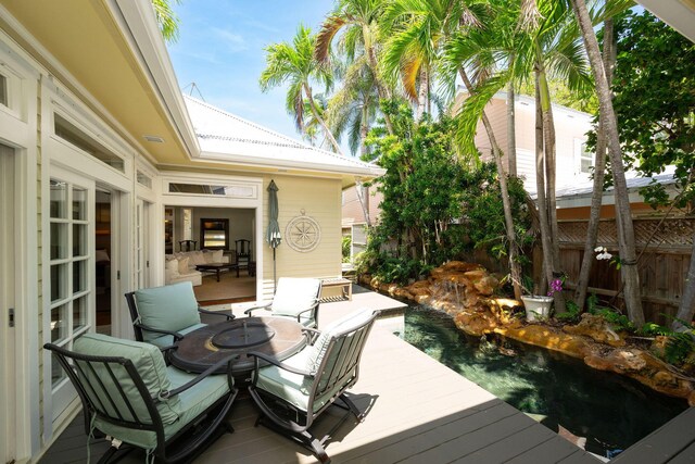 1104 S Street, Key West, FL 33040 - deck featuring an outdoor pool and fence