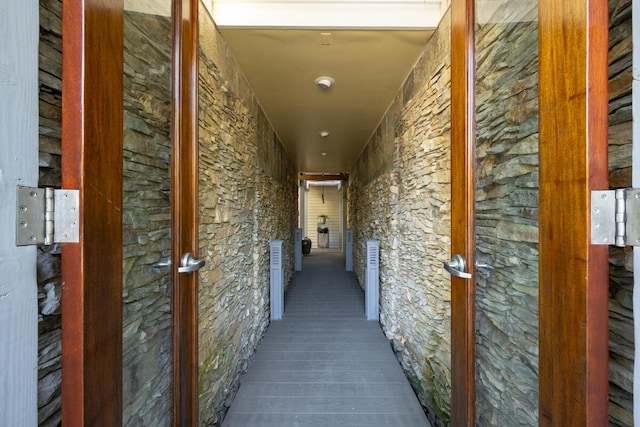 corridor with wood finished floors