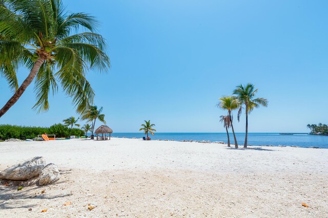 view of water feature featuring a gazebo and a view of the beach