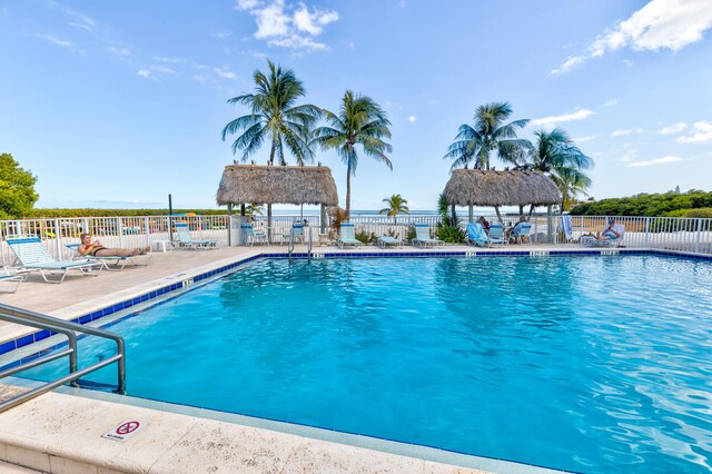 view of swimming pool featuring a gazebo and a patio area