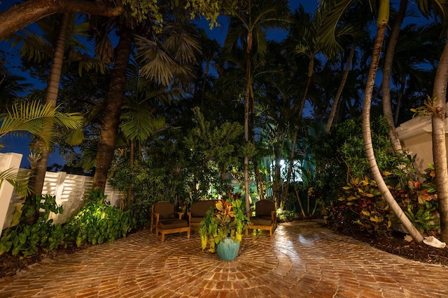 patio at twilight with fence