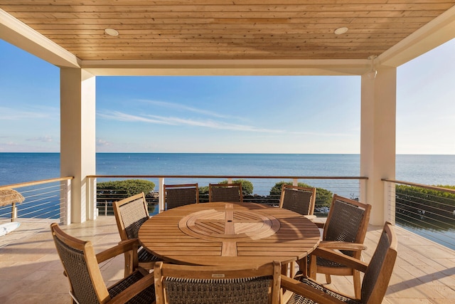 balcony featuring a water view