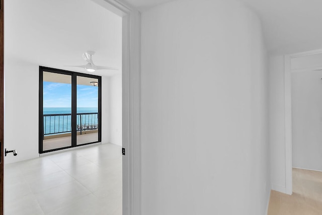 hallway with a wall of windows