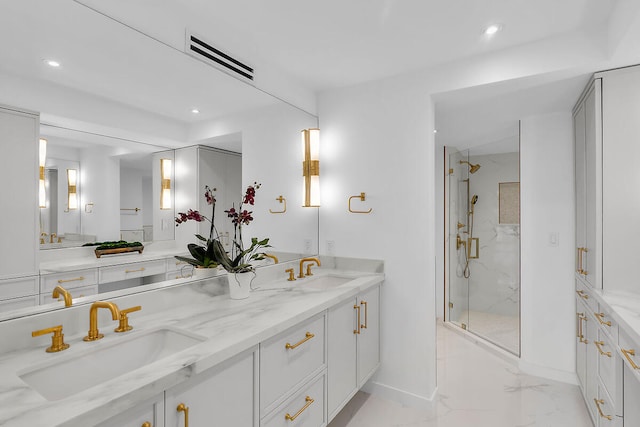 full bathroom with visible vents, marble finish floor, a sink, and a marble finish shower