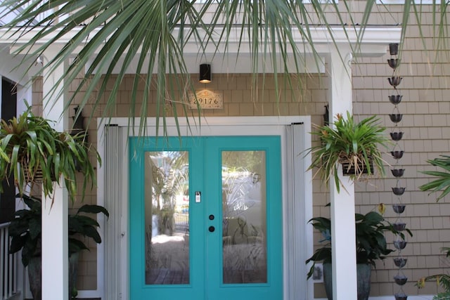 doorway to property featuring french doors