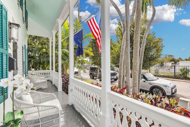 balcony featuring covered porch