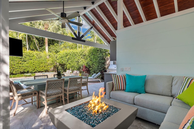 view of patio featuring a grill, a fire pit, and ceiling fan