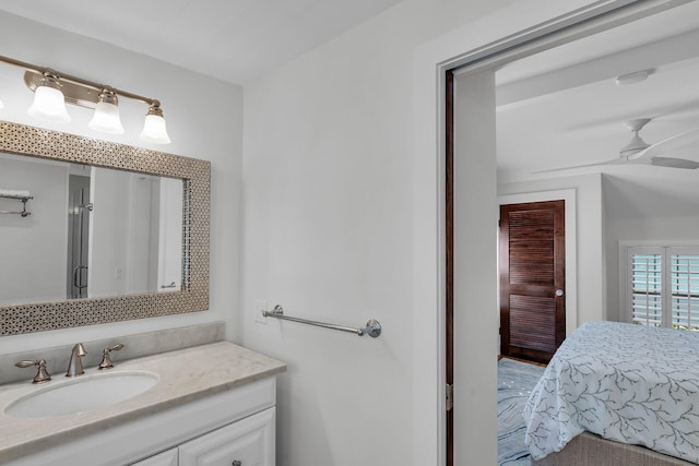 bathroom featuring vanity and ceiling fan