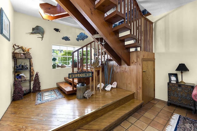 staircase featuring tile patterned floors