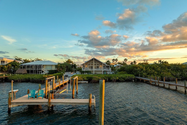 view of dock with a water view