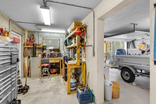 garage with a workshop area